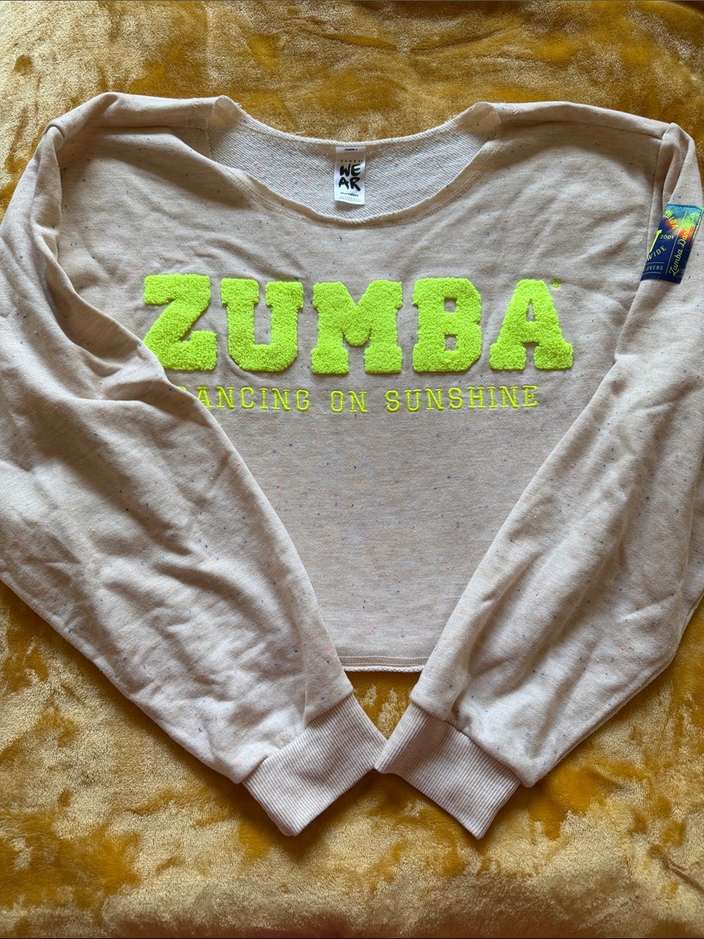 Zumba Fitness Cream Cropped Sweatshirt with Neon Yellow Logo